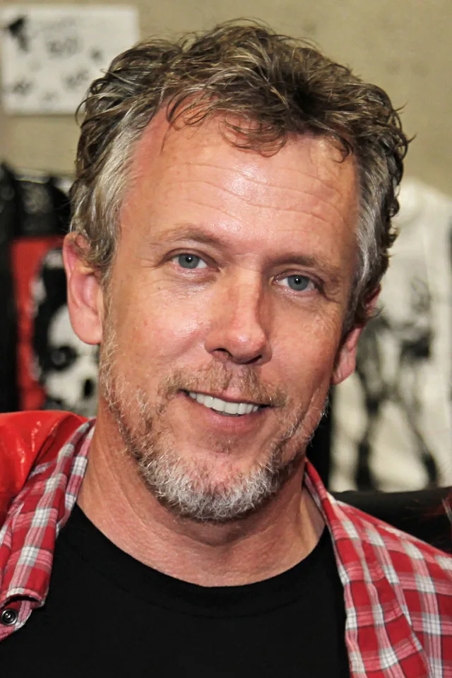 Tom Byron in 2012, black tee and plaid shirt