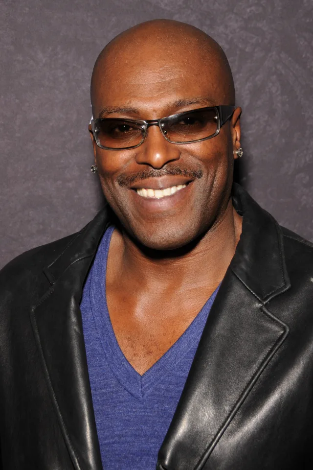 Lexington Steele at the 2014 AVN Expo, leather jacket and blue V-neck